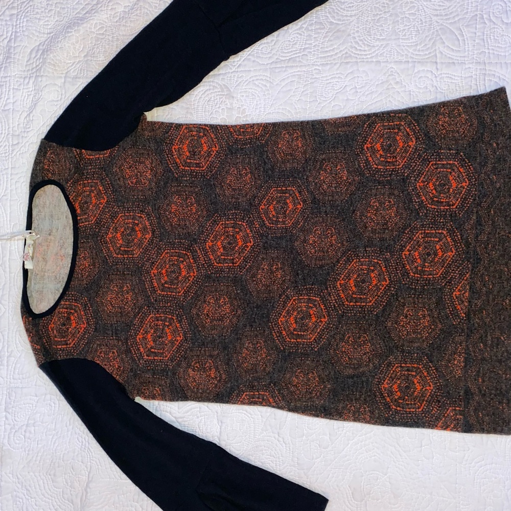 Black with orange circle like shapes